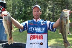 Terry Bolton of Jonesboro, Ark., boated an 18-pound, 1-ounce catch to grab a share of the overall lead at the FLW Tour event on Lake Ouachita.