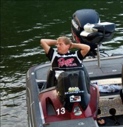 Boater Dennis Forbes of Medicine Lodge, Kan., enjoys a moment of peace before takeoff on day one of the All-American.