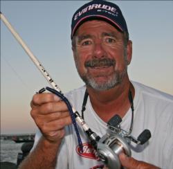 Hoping to find the big fish that will move him up from his 13th place spot, Larry Nixon will throw a Texas-rigged worm.