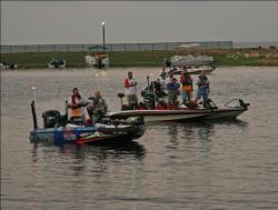 Anglers pause for the national anthem before the final takeoff on Toledo Bend.