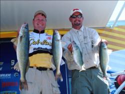 Pro Kevin McQuoid of Isle, Minn., and co-angler Ron Lowry of Lakewood, Colo., brought in five walleyes weighing 15 pounds, 5 ounces Thursday to lead day one of the FLW Walleye Tour Western Division tournament on Lake Oahe.