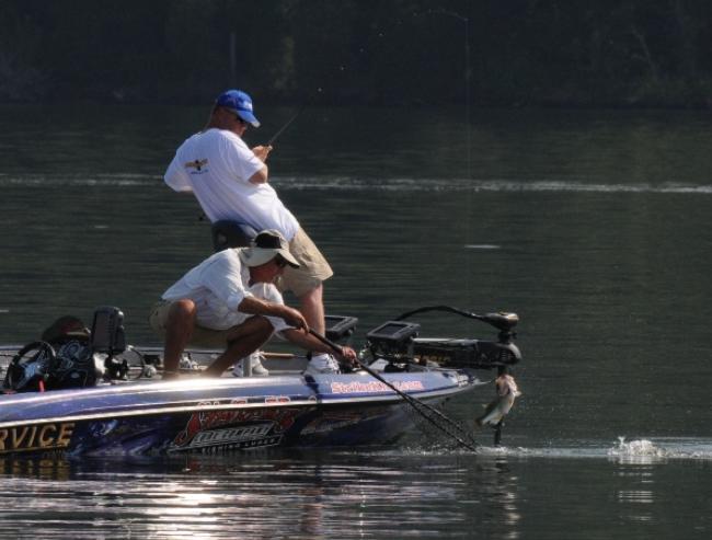 Second place pro Mark Rose hauls in another keeper on day three.