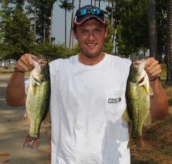 Co-angler Aaron Combs of Jackson, Ky., still holds the lead with a two-day total of 24 pounds, 4 ounces.