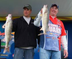 National Guard pro Mark Courts and co-angler Ted Kaminski show off their two overs from Thursday