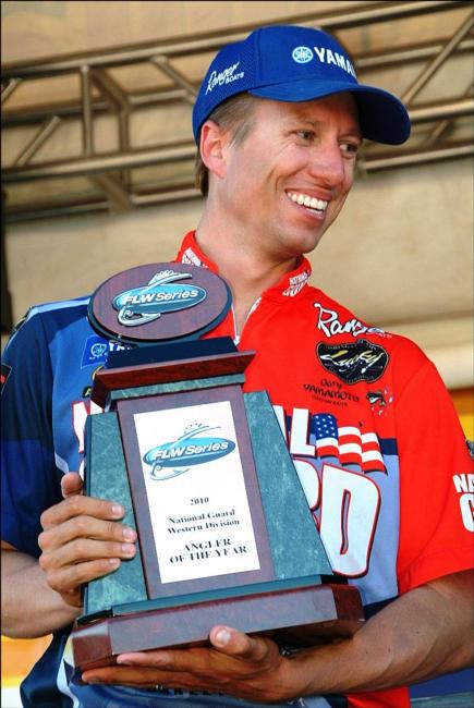 Brent Ehrler of Redlands, Calif., proudly displays his 2010 FLW Series Western Division Angler of the Year trophy before the start of final weigh-in.