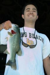 Cal State University at Long Beach team member Dane Christensen shows off part of his team's 7-pound, 10-ounce catch. Cal State took home top honors at the FLW College Fishing event on Lake Roosevelt, winning $10,000 in scholarships. The team also qualified for the upcoming FLW College Fishing Regional in Sacramento.