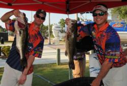 Jake Gipson and Matthew Wercinski show off their big bass on day one.
