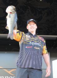Thomas Frink holds up a monster bass to put Kennesaw State University in third place with 14-6.