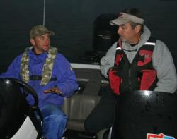 Jeremy Wiggins discusses lake conditions with his co-angler partner David Underwood.