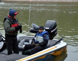 Veteran bass pro Tommy Martin visits with fellow EverStart Series competitors and co-angler Darrell Denton before takeoff.