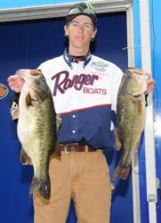 Clark Smith of Pell City, Ala., is in third place with five bass weighing 23 pounds, 9 ounces. His limit was anchored by an 8-pound, 4-ounce monster that took big bass honors on day one.