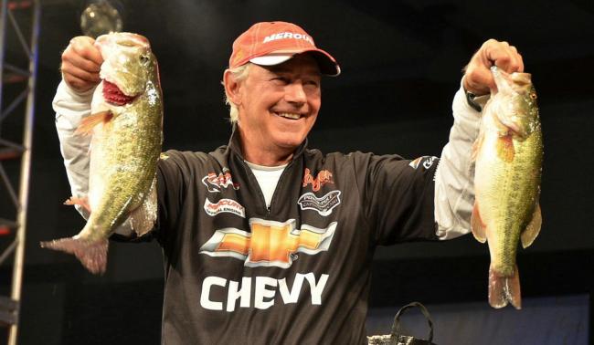 Third-place pro Tom Monsoor holds up a pair of Chickamauga largemouths.