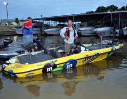 M&Ms pro Jim Moynagh puts on his life jacket in preparation of FLW Tour competition on the Red River.