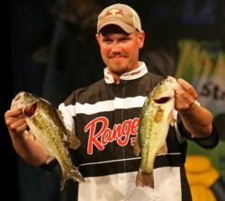 Third-place co-angler shows off two of the fish that comprised his limit catch of 10-8.