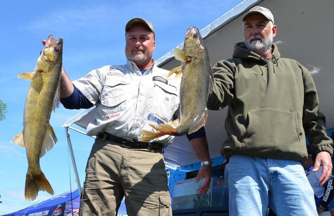 Pro Duane Kriese and co-angler Dan Soehren hold up their two 