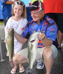 Fourth-place pro Mark Rose holds up a pair of Kentucky Lake largemouths with his daughter, Hannah Grace.