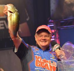 Third-place pro Mark Rose holds up his biggest bass from day four on Lake Ouachita.