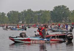 EverStart anglers stand for the national anthem prior to the day-two takeoff.