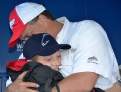 Co-angler Terry Stevens of Sterling, Va., embraces his son shortly after winning the EverStart Potomac River title.