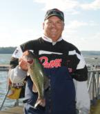 Second-place pro Tripp Pittman holds up one of his five Lake Guntersville keepers. 
