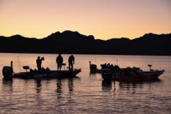 National Guard FLW College Fishing Western Regional Championship anglers patiently await the start of opening takeoff on Saguaro Lake as the sun slowly drifts over the horizon.