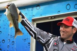 Pro Zack Thompson of Alameda, Calif., shows off his second-place catch at the EverStart Lake Shasta event.