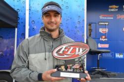Blaine Christiansen of San Jose, Calif., shows off his first-place trophy after winning the EverStart co-angler title on Lake Shasta.