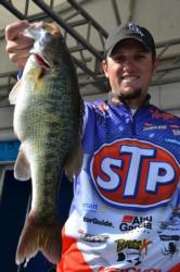 Pro Stetson Blaylock of Benton, Ark., shows off his 14-pound catch on Lake Hartwell.