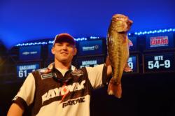 Micah Frazier of Newnan, Ga., proudly displays his second-place catch during the finals of the FLW Tour Lake Hartwell event.
