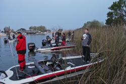 Anglers pause for the national anthem prior to the day-one take off.
