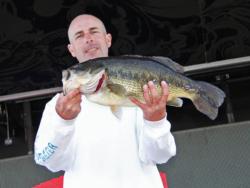 Co-angler Kenny Mueller took Snickers Big Bass honors with this 8-pound, 13-ounce fish.