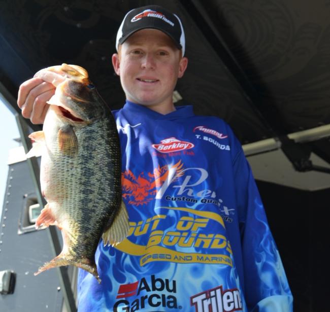 Co-angler Travis Bounds of Roseville, Calif., shows off part of his first-place catch on Clear Lake.