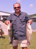 Rick Cotten of Guntersville, Ala., is in third place with 49 pounds, 6 ounces.