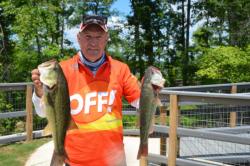 Off! pro Nick Gainey shows two nice fish from his 12-pound, 15-ounce bag on day two.