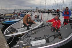 National Guard pro and two-time Champlain winner Scott Martin organizes his rods as his father, legendary bass angler Roland Martin looks on.