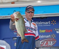 Placing fourteenth on day one, Evinrude pro Andy Morgan tied pro leader David Dudley for the Snickers Big Bass award with his 6-pounder.