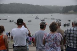 Bass-fishing fans watch takeoff unfold in the early morning hours on Lake Lanier.