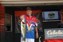 Colby Cowart of Florida, the 11-14 Southern Division Champion, shows off his catch.