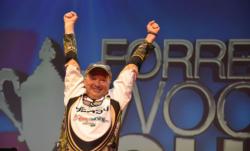 Timothy Dearing of Loudon, Tenn., thrusts his arms into the air after capturing the 2012 Forrest Wood Cup co-angler title.