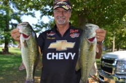 Pro Chris Dillow of Waynesboro, Va., shows off his two-day catch of 30 pounds, 1 ounce on the Potomac River.