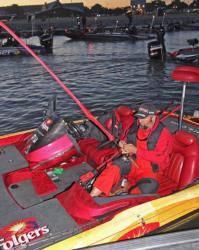 Co-angler  Craig Daino preps his gear as he waits for the day-one takeoff.