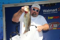Ritter Ferguson lifts one of the leading bass from his bag.