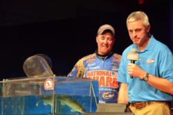 National Guard pro Mark Courts looks on as his one fish hits the scales for 1 pound, 12 ounces. Courts earned $10,000 for his fifth-place finish. 