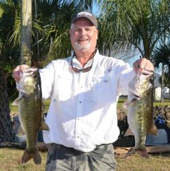 Second-place co-angler Bill Cowart holds up part of his 16-pound, 9-ounce limit. 