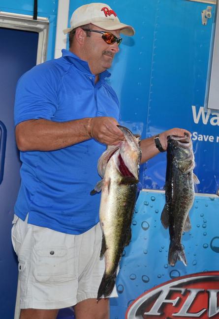 Second-place pro Rick Cotten of Guntersville, Ala., holds up part of his 24-pound stringer.