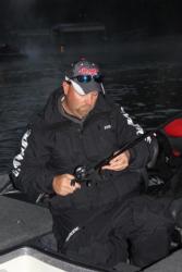 Terry Rose readies one of the plastic baits he