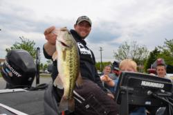 Joseph Wood of Westport, Mass., holds up his kicker from day three which was part of his 15-5 limit to keep him in second place. 