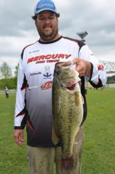 Pro Todd Rasberry of Killen, Ala., shows off his whopping 10-pound, 10-ounce largemouth during the first day of EverStart Series Central Division competition on Pickwick Lake.