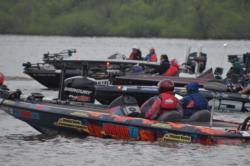 FLW Tour boaters head to the starting line before the commencement of day-one takeoff on Grand Lake.