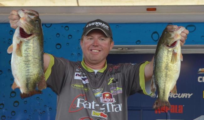 Pro winner Casey Martin holds up his two biggest bass from day four on Lake Chickamauga.